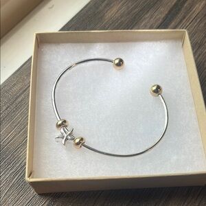 Elegant Silver and Gold Starfish Bracelet